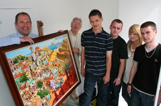 Joe Scarborough unveils a painting for Sheffield Showcase to some of the young creative talent involved
